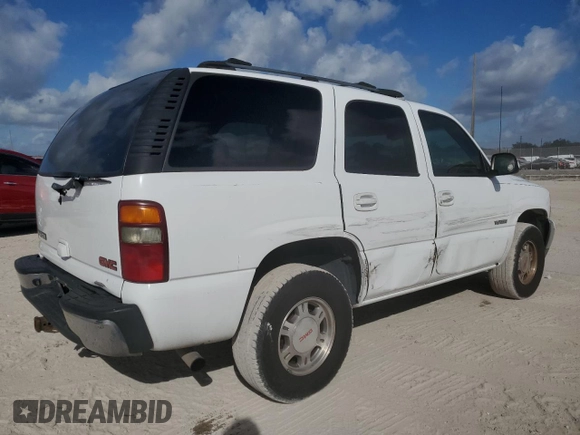 2002 GMC Yukon SLT with VIN 1GKEC13V12R196673, listed as a Copart auction lot 44921005 with 217,403 mi miles and Salvage Title. Bid and sale history available at carsss.com. Image 3.