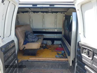2009 Chevrolet Express Cargo Van with VIN 1GCGG25C791125061, listed as a IAAI auction lot 42131397 with 247,397 mi miles. Bid and sale history available at carsss.com. Image 8.
