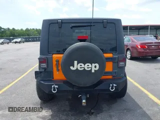 2013 Jeep Wrangler Sport z VIN 1C4AJWAG2DL538526, wystawiony jako IAAI lot #42378501 z przebiegiem 81 709 mil mil oraz . Historia ofert i sprzedaży dostępna na DreamBid. Obrazek 17.