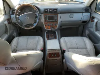 2000 Mercedes-Benz M-Class with VIN 4JGAB54E6YA181947, listed as a Copart auction lot 77781524 with 165,399 mi miles and Salvage Title. Bid and sale history available at carsss.com. Image 8.