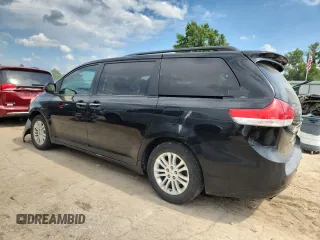 2011 Toyota Sienna XLE AAS with VIN 5TDYK3DC5BS081015, listed as a Copart auction lot 61096595 with 291,855 mi miles and Salvage title. Bid and sale history available at DreamBid. Image 2.