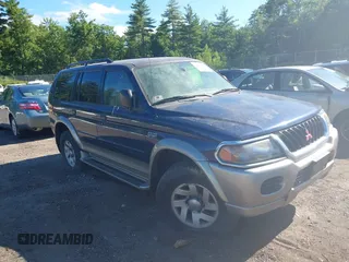 2001 Mitsubishi Montero Sport LS with VIN JA4MT31H81P039209, listed as a IAAI auction lot 41592089 with 174,416 mi miles. Bid and sale history available at carsss.com. Image 6.