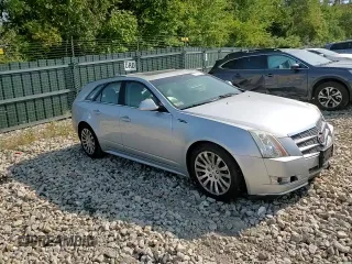 2010 Cadillac CTS Performance z VIN 1G6DM8EG9A0126811, wystawiony jako Copart lot #71155534 z przebiegiem 146 947 mil mil oraz Szkoda całkowita • Salvage title. Historia ofert i sprzedaży dostępna na DreamBid. Obrazek 11.