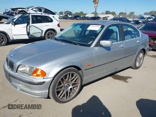 2001 BMW 3 Series 330i with VIN WBAAV53451FJ66575, listed as a IAAI auction lot 41665948 with 197,048 mi miles. Bid and sale history available at carsss.com. Image 2.