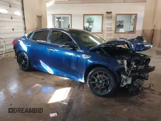 2016 Kia Optima LX with VIN 5XXGT4L33GG026572, listed as a IAAI auction lot 41514872 with 135,423 mi miles. Bid and sale history available at carsss.com. Image 1.