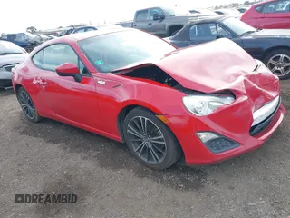 2014 Scion FR-S z VIN JF1ZNAA16E9701818, wystawiony jako IAAI lot #41602515 z przebiegiem 142 344 mil mil oraz . Historia ofert i sprzedaży dostępna na DreamBid. Obrazek 1.