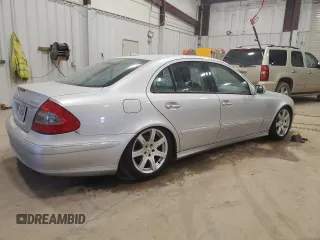 2007 Mercedes-Benz E 550 with VIN WDBUF90X97X214955, listed as a Copart auction lot 86971334 with 144,097 mi miles and Non Repairable. Bid and sale history available at carsss.com. Image 3.