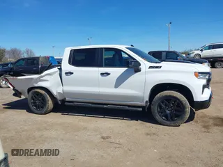 2023 Chevrolet Silverado 1500 LT Trail Boss with VIN 3GCUDFEDXPG253353, listed as a IAAI auction lot 41622661 with 36,487 mi miles and . Bid and sale history available at DreamBid. Image 13.