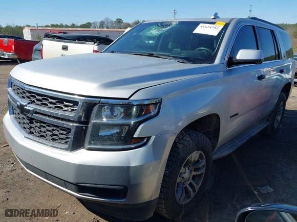 2015 Chevrolet Tahoe LT with VIN 1GNSCBKCXFR555438, listed as a IAAI auction lot 41624792 with 187,959 mi miles. Bid and sale history available at carsss.com. Image 2.