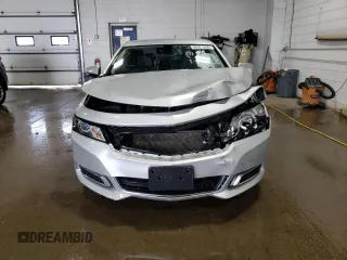 2016 Chevrolet Impala LT z VIN 2G1115S39G9178777, wystawiony jako Copart lot #56921855 z przebiegiem 175 037 mil mil oraz Szkoda całkowita • Salvage title. Historia ofert i sprzedaży dostępna na DreamBid. Obrazek 5.