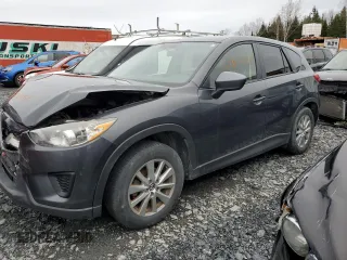 2014 Mazda CX-5 Sport z VIN JM3KE4BE0E0428322, wystawiony jako Copart lot #56012495 z przebiegiem 278 146 mil mil oraz Szkoda całkowita • Salvage title. Historia ofert i sprzedaży dostępna na DreamBid. Obrazek 1.
