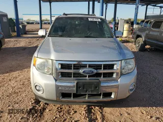 2011 Ford Escape Limited with VIN 1FMCU9EG2BKA74440, listed as a Copart auction lot 61081835 with 136,933 mi miles and Salvage title. Bid and sale history available at DreamBid. Image 5.
