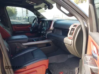 2019 Ram 1500 Rebel z VIN 1C6SRFLT2KN696557, wystawiony jako IAAI lot #42110931 z przebiegiem 81 372 mil mil oraz . Historia ofert i sprzedaży dostępna na DreamBid. Obrazek 5.