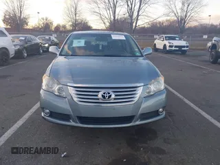 2010 Toyota Avalon XL with VIN 4T1BK3DB1AU363817, listed as a IAAI auction lot 41010053 with 259,106 mi miles and . Bid and sale history available at carsss.com. Image 13.