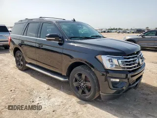 2021 Ford Expedition XLT with VIN 1FMJU1HT2MEA86414, listed as a Copart auction lot 63313645 with 28,544 mi miles and Salvage title. Bid and sale history available at DreamBid. Image 4.