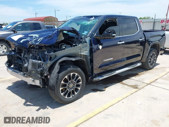2023 Toyota Tundra Limited with VIN 5TFJA5DB9PX117183, listed as a IAAI auction lot 42352970 with 15,082 mi miles and . Bid and sale history available at DreamBid. Image 17.