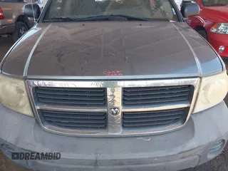 2008 Dodge Durango SXT with VIN 1D8HD38KX8F103709, listed as a IAAI auction lot 42588956 with 277,572 mi miles and . Bid and sale history available at DreamBid. Image 10.