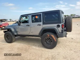 2015 Jeep Wrangler Unlimited Rubicon z VIN 1C4BJWFG0FL529310, wystawiony jako Copart lot #64337405 z przebiegiem Nie podano mil oraz Szkoda całkowita • Salvage title. Historia ofert i sprzedaży dostępna na DreamBid. Obrazek 2.