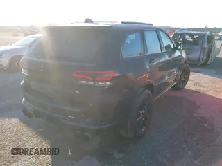 2018 Jeep Grand Cherokee High Altitude with VIN 1C4RJFCT4JC378030, listed as a IAAI auction lot 41319022 with 113,806 mi miles. Bid and sale history available at carsss.com. Image 4.