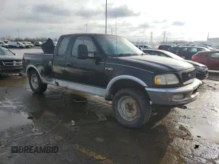 1997 Ford F-150 z VIN 1FTDX08W4VKD75892, wystawiony jako Copart lot #85554054 z przebiegiem 280 706 mil mil oraz Czysty tytuł • Clean title. Historia ofert i sprzedaży dostępna na DreamBid. Obrazek 4.