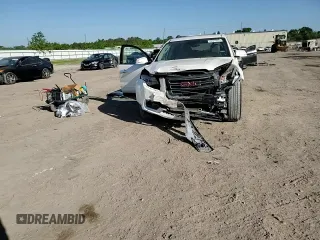 2015 GMC Acadia SLT z VIN 1GKKRSKD1FJ136798, wystawiony jako Copart lot #52318975 z przebiegiem Nie podano mil oraz Szkoda całkowita • Salvage title. Historia ofert i sprzedaży dostępna na DreamBid. Obrazek 11.