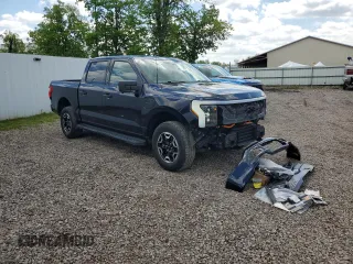 2022 Ford F-150 Lightning Pro z VIN 1FTVW1EL6NWG04931, wystawiony jako Copart lot #59096435 z przebiegiem 26 616 mil mil oraz Szkody całkowita. Historia ofert i sprzedaży dostępna na DreamBid. Obrazek 12.