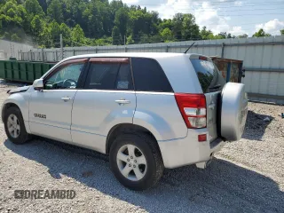 2011 Suzuki Grand Vitara Premium z VIN JS3TD0D29B4103041, wystawiony jako Copart lot #62066985 z przebiegiem 219 727 mil mil oraz Szkoda całkowita • Salvage title. Historia ofert i sprzedaży dostępna na DreamBid. Obrazek 2.