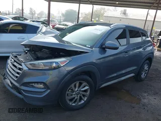 2018 Hyundai Tucson SEL with VIN KM8J33A47JU768935, listed as a IAAI auction lot 41007821 with 125,678 mi miles. Bid and sale history available at carsss.com. Image 14.