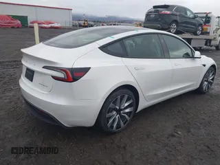 2025 Tesla Model 3 Long Range with VIN 5YJ3E1EB9SF890212, listed as a IAAI auction lot 41671411 with 3 mi miles and . Bid and sale history available at DreamBid. Image 4.