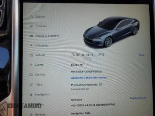 2013 Tesla Model S with VIN 5YJSA1CG9DFP09733, listed as a Copart auction lot 87739005 with 88,163 mi miles and Salvage title. Bid and sale history available at DreamBid. Image 9.