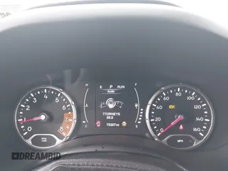 2020 Jeep Renegade Latitude z VIN ZACNJBBB0LPL76965, wystawiony jako IAAI lot #42319436 z przebiegiem 75 307 mil mil oraz . Historia ofert i sprzedaży dostępna na DreamBid. Obrazek 7.