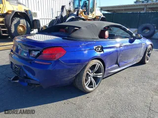 2018 BMW M6 with VIN WBS6G9C56JBM23844, listed as a IAAI auction lot 41206052 with 32,670 mi miles. Bid and sale history available at carsss.com. Image 4.