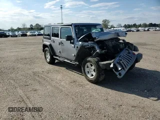 2013 Jeep Wrangler Unlimited Sport z VIN 1C4BJWDG7DL597491, wystawiony jako Copart lot #50719435 z przebiegiem Nie podano mil oraz Szkoda całkowita • Salvage title. Historia ofert i sprzedaży dostępna na DreamBid. Obrazek 12.