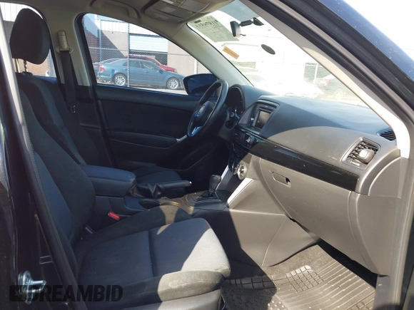 2014 Mazda CX-5 Sport with VIN JM3KE4BE6E0388909, listed as a IAAI auction lot 41876514 with 196,882 mi miles. Bid and sale history available at carsss.com. Image 5.
