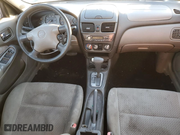 2000 Nissan Sentra XE with VIN 3N1CB51D3YL316712, listed as a Copart auction lot 84512254 with 228,070 mi miles and Salvage title. Bid and sale history available at DreamBid. Image 8.
