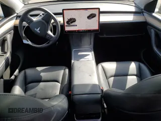 2024 Tesla Model Y Long Range with VIN 7SAYGDEE6RA219456, listed as a Copart auction lot 61855165 with 29,869 mi miles and Salvage title. Bid and sale history available at DreamBid. Image 8.