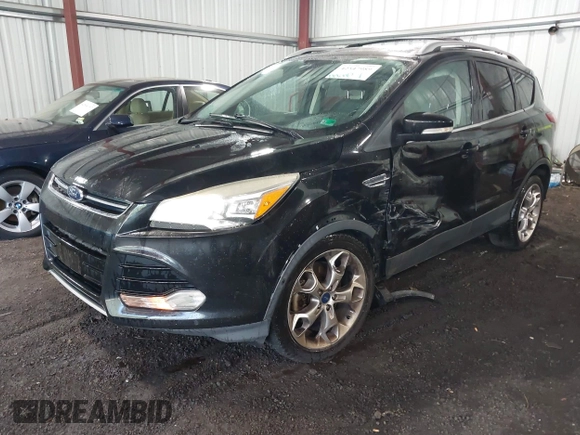 2015 Ford Escape Titanium with VIN 1FMCU9J98FUB00525, listed as a IAAI auction lot 42547989 with 194,040 mi miles and . Bid and sale history available at DreamBid. Image 2.