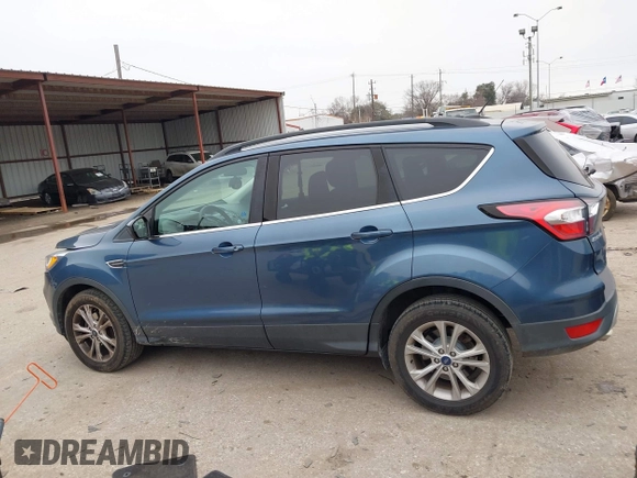 2018 Ford Escape SE with VIN 1FMCU0GD0JUC58115, listed as a IAAI auction lot 41578309 with 76,162 mi miles. Bid and sale history available at carsss.com. Image 14.
