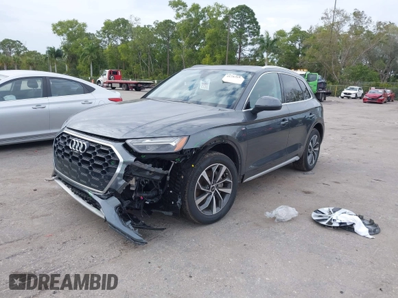 2023 Audi Q5 S line Premium Plus z VIN WA1EAAFY6P2161080, wystawiony jako IAAI lot #41282613 z przebiegiem 20 268 mil mil oraz . Historia ofert i sprzedaży dostępna na DreamBid. Obrazek 17.