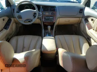 2001 Mitsubishi Diamante LS z VIN 6MMAP67P11T004859, wystawiony jako Copart lot #78678394 z przebiegiem 49 671 mil mil oraz Tytuł czysty. Historia ofert i sprzedaży dostępna na DreamBid. Obrazek 8.