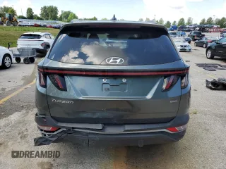 2023 Hyundai Tucson SEL with VIN 5NMJBCAEXPH209637, listed as a Copart auction lot 63222495 with 62,009 mi miles and Clean title. Bid and sale history available at DreamBid. Image 6.