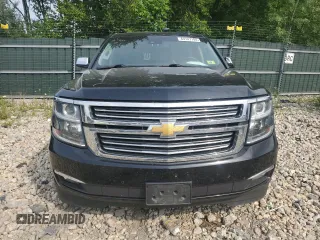 2015 Chevrolet Suburban LTZ with VIN 1GNSKKKC8FR199218, listed as a Copart auction lot 64147184 with 181,676 mi miles and Salvage Title. Bid and sale history available at DreamBid. Image 5.