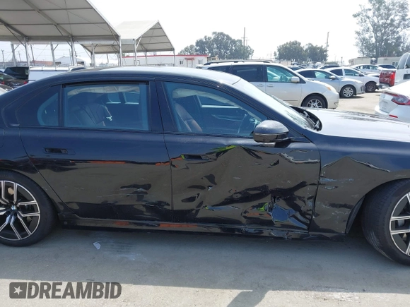 2023 BMW 7 Series 740i with VIN WBA23EH02PCM14257, listed as a IAAI auction lot 42408167 with Not provided miles and . Bid and sale history available at DreamBid. Image 13.