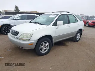2001 Lexus RX 300 with VIN JTJGF10U010092702, listed as a IAAI auction lot 42489593 with 215,966 mi miles and . Bid and sale history available at DreamBid. Image 2.