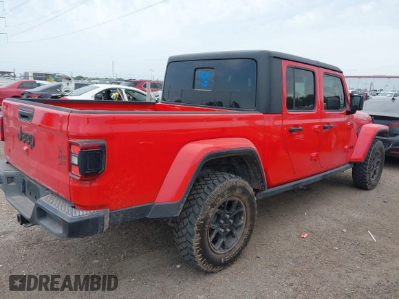 2024 Jeep Gladiator Sport with VIN 1C6HJTAG5RL101616, listed as a IAAI auction lot 42156992 with 31,824 mi miles and . Bid and sale history available at DreamBid. Image 4.