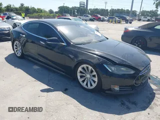 2014 Tesla Model S P85D with VIN 5YJSA1H25EFP65571, listed as a IAAI auction lot 42185442 with 115,990 mi miles and . Bid and sale history available at DreamBid. Image 1.