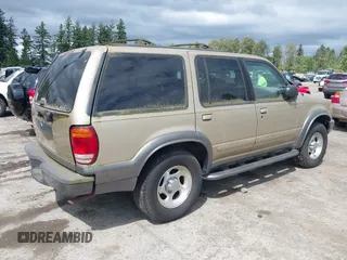 2001 Ford Explorer XLT z VIN 1FMZU73E71ZA79770, wystawiony jako IAAI lot #42499921 z przebiegiem 174 050 mil mil oraz . Historia ofert i sprzedaży dostępna na DreamBid. Obrazek 4.