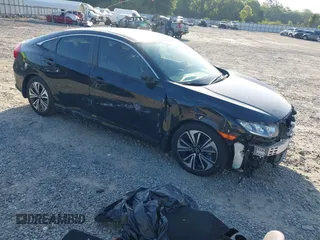 2018 Honda Civic EX-T z VIN JHMFC1F35JX007641, wystawiony jako IAAI lot #42165560 z przebiegiem 86 134 mil mil oraz . Historia ofert i sprzedaży dostępna na DreamBid. Obrazek 1.