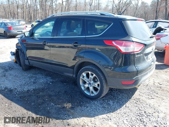 2014 Ford Escape Titanium with VIN 1FMCU9JX2EUA96338, listed as a IAAI auction lot 41806850 with 127,745 mi miles. Bid and sale history available at carsss.com. Image 3.
