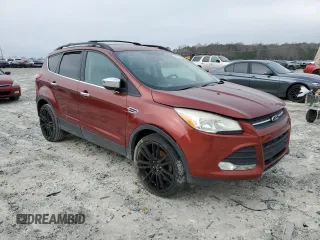 2014 Ford Escape SE with VIN 1FMCU0GX6EUB43745, listed as a Copart auction lot 85299354 with 160,647 mi miles and Salvage Title. Bid and sale history available at DreamBid. Image 4.